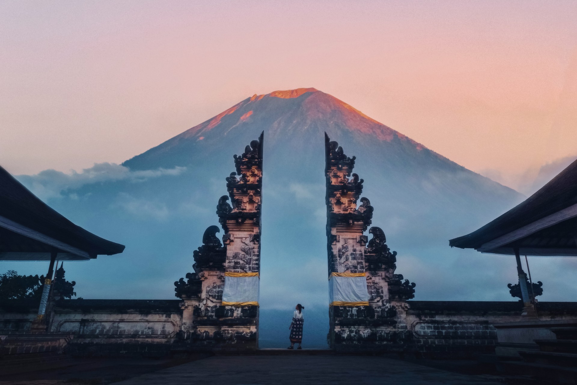 Traveler Standing at the Gates of Pura Lempuyang Temple aka Gates of Heaven Bali, Indonesia